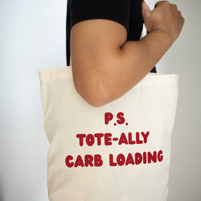 Canvas tote bag with red text Carb loading